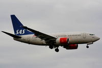 LN-RRZ @ EGCC - Scandinavian B737 on approach for RW05L - by Chris Hall