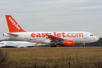 G-EZFG @ EGCC - easyJet A318 lining up on lining up on RW05L - by Chris Hall