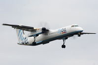 G-ECOR @ EGCC - flybe Dash-8 on approach for RW05L - by Chris Hall