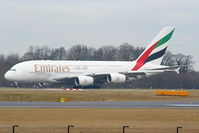 A6-EDA @ EGCC - Emirates A380 taxiing to RW05R - by Chris Hall