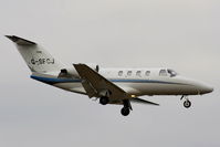 G-SFCJ @ EGCC - Sureflight Aviation Cessna 525 CitationJet on approach for RW05L - by Chris Hall