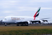A6-EDA @ EGCC - Emirates A380 A6-EDA touching down on RW05R - by Chris Hall