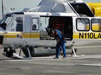N110LA @ POC - Putting on hoist harnesses and getting ready to leave for a rescue - by Helicopterfriend
