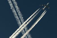 UNKNOWN @ NONE - Cathay Pacific B747-400 crossing another huge contrail while cruising to Asia - by Friedrich Becker
