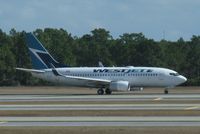 C-FXWJ @ KMCO - WestJet Boeing 737-7CT - by Kreg Anderson