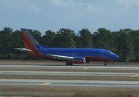 N511SW @ KMCO - Southwest Airlines Boeing 737-5H4 - by Kreg Anderson