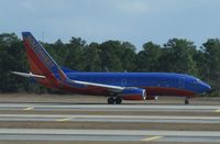 N770SA @ KMCO - Southwest Airlines Boeing 737-700 - by Kreg Anderson