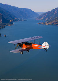 N7662 - WAAAM's 1928 WACO 10 Flying over the Columbia River in Hood River Oregon - by Richard Hallman