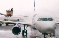 OH-LXC @ HEL - Finnair , De-icing before departure to Amsterdam - by Henk Geerlings
