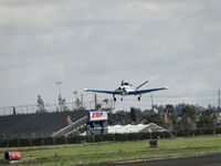 N9657Y @ POC - On final, over the threshold of runway 26L - by Helicopterfriend