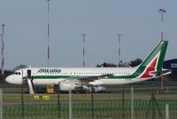 EI-DSN @ EGSH - Parked in the sun with it's new Alitalia paint scheme. - by Graham Reeve