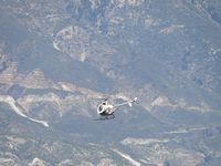 N90570 @ L67 - Heading northwesterly towards the mountains - by Helicopterfriend