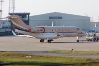 OE-HOO @ EGGW - Bombardier BD-100-1A10 Challenger 300, c/n: 20079 being pushed onto stand 16 at Luton - by Terry Fletcher