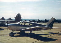 G-AWSL - G-AWSL parked on the apron at RAF Chivenor, North Devon, UK, next to Meteors and Hunters, while on a visit from its home airfield of Fairoaks, Surrey. 1974 approx. - by P.B.Tucker