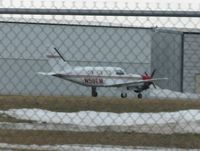 N59EM @ KDTL - Taken while driving down Airport Road. Piper PA-46-310P Malibu. - by Kreg Anderson