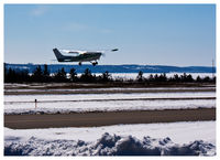 N58944 @ MGN - Taking off from Harbor Springs Airport - by William C. Coffman