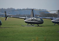 G-OONA @ EGTB - Robinson R44 II at Wycombe Air Park - by moxy