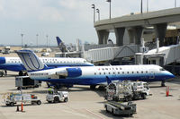 N932SW @ DFW - United Express at the gate - DFW Airport