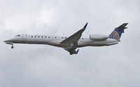 N11119 @ KORD - ExpressJet/United Express, BTA5874 arriving from KBWI, on approach RWY 28 KORD. - by Mark Kalfas