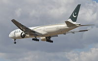 AP-BGL @ KORD - Pakistan International Airlines Boeing 777-240 (ER), PIA795 arriving from LEBL, on approach RWY 28 KORD. - by Mark Kalfas