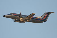 N581SW @ KLAX - SkyWest/United Express Embraer EMB-120ER, SKW7015 departing RWY 25R KLAX enroute to KCRQ. - by Mark Kalfas