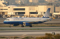 N482UA @ KLAX - United Airlines Airbus A320-232, arriving KLAX off 25L on TWY H. - by Mark Kalfas
