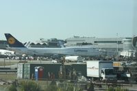 D-ABVC @ MIA - Lufthansa 747-400 taken thru windshield of car at MIA - by Florida Metal