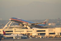 N689AA @ KLAX - American Airlines Boeing 757-223, AAL297 departing RWY 25R KLAX, enroute to PHNL. - by Mark Kalfas