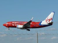 VH-VBP @ YMML - Virgin Blue Boeing 737 VH-VBP about to touch down on runway 34 at Melbourne (Tullamarine) - by red750