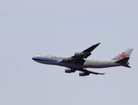 B-18716 - Flying over Mineola, NY, going to a landing at JFK - by gbmax