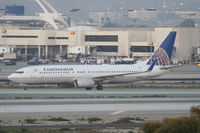 N14230 @ KLAX - Continental Airlines Boeing 737-824, COA795 arriving from KIAH, on TWY H KLAX> - by Mark Kalfas