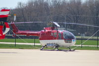 N915SH @ KDPA - Photographed through a chain-link fence.