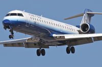 N744SK @ KORD - SkyWest/United Express Bombardier CL-600-2C10, SKW6669 arriving from KMSP, RWY 28 approach KORD. - by Mark Kalfas