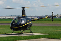 G-OSAZ @ EGBW - 1989 Robinson Helicopter Co Inc ROBINSON R22 BETA, c/n: 1005 (ex G-DERB) - by Terry Fletcher
