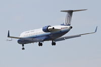 N913SW @ KORD - SkyWest/United Express Bombardier CL-600-2B19, SKW6542 arriving from KSTL, RWY 28 approach KORD. - by Mark Kalfas