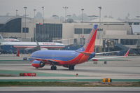 N700GS @ KLAX - Southwest Airlines Boeing 737-7H4, N700GS on TWY P KLAX. - by Mark Kalfas
