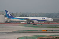 JA716A @ KLAX - ANA Boeing Aircraft Co B777-287(ER), JA 716A TWY B KLAX. - by Mark Kalfas