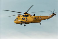 XZ589 @ EGQS - Sea King HAR.3 of 202 Squadron at RAF Lossiemouth returning home in the Summer of 1994. - by Peter Nicholson