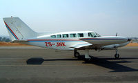 ZS-JNK @ FALA - Cessna 402B [402B-1017] Lanseria~ZS 05/10/2003 - by Ray Barber