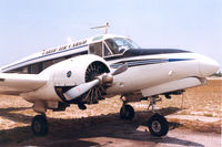 N38BW @ LNA - Carib- Air Cargo ; bended prop - by Henk Geerlings