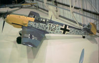 4101 - Bf-109E known as Black 12 on display at the RAF Museum at Hendon as seen in May 1983. - by Peter Nicholson