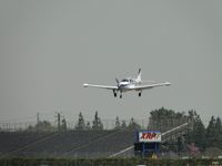 N367HP @ POC - Passing over the outer fence on final for runway 26L - by Helicopterfriend