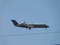 N944SW @ LAX - Sky West, United Express, 1/2 miles east of LAX on final to runway 24 - by Helicopterfriend