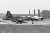K-3039 @ EHTW - NF-5A fighter of 313 sqn of the Royal Netherlands Air Force taxying onto the runway at Twente air base, 1980. - by Henk van Capelle