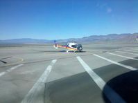 N136PH @ BVU - Papillon Helicopter parked awaiting tourists going to view the Las Vegas area. - by Ehud Gavron
