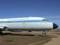 N810NA - Convair Model 30 (CV 990 Coronado) outside Mojave airport (now sadly degraded to an aircraft shaped billboard), Mojave CA