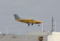 N521FA @ MIA - Cessna 402C - by Florida Metal