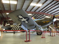 N4235Y @ KCNO - North American P-51A Mustang at the Planes of Fame Air Museum, Chino CA