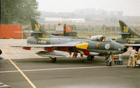 J-4030 @ EGVA - Hunter F.58 of the Patrouille Suisse aerobatic display team in 30 years anniversary markings on the flight-line at the 1994 Intnl Air Tattoo at RAF Fairford. - by Peter Nicholson