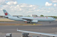 C-GHKW @ EGLL - Taxiing back after landing on 27R - by Robert Kearney